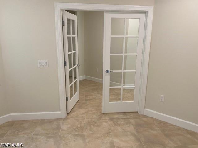 5701 Mayflower Way, Unit 1307 Immokalee, FL 34142 - Photo 6 of 8 an empty room with windows