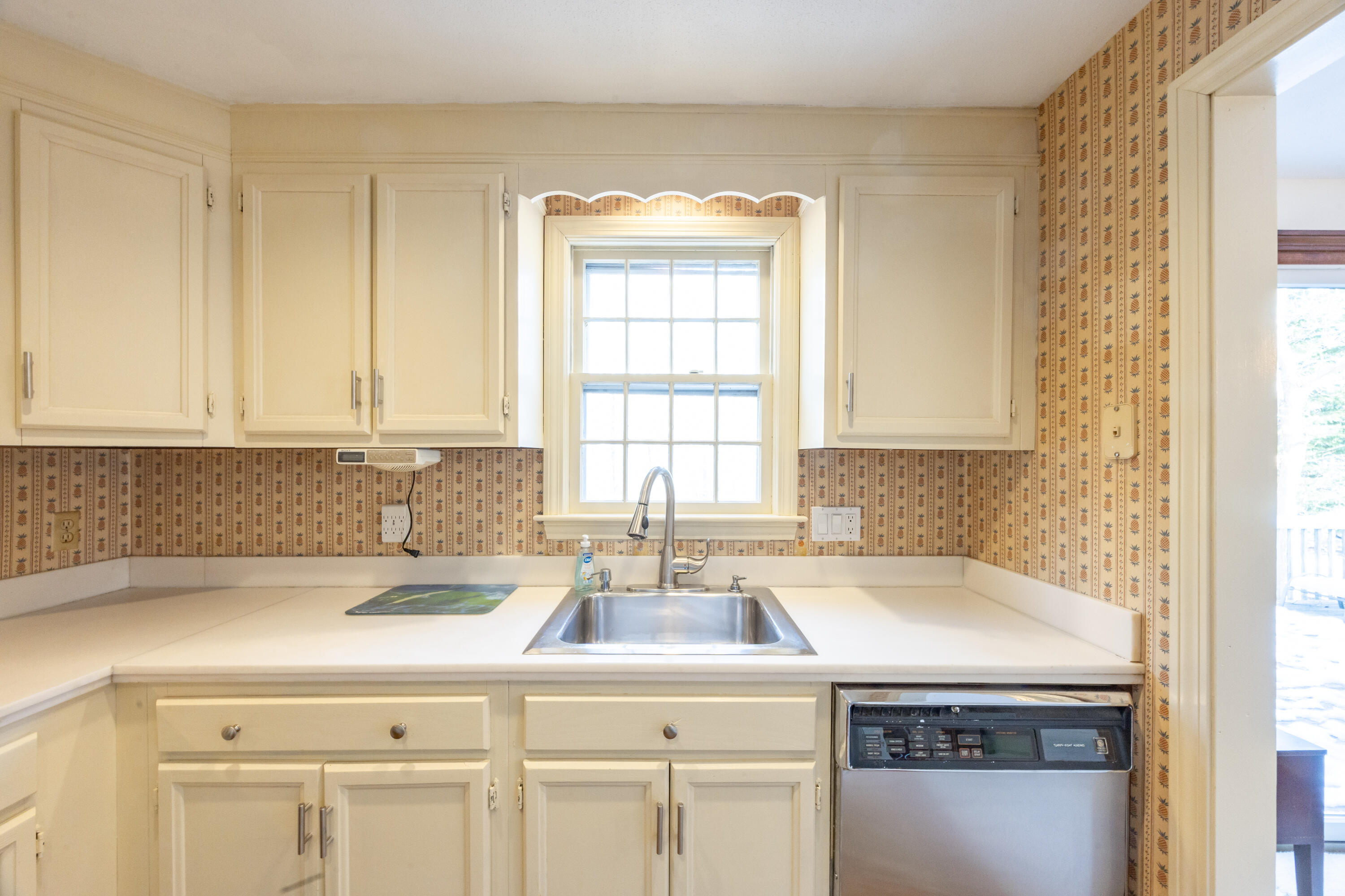 12 Canapitsit Drive East Falmouth, MA 02536 - Photo 11 of 34 a kitchen with a sink cabinets and window
