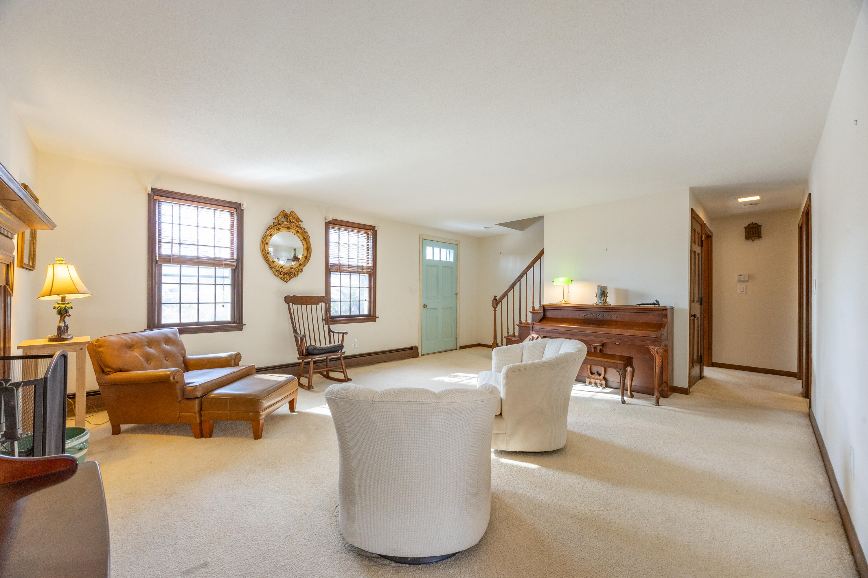 12 Canapitsit Drive East Falmouth, MA 02536 - Photo 13 of 34 a living room with a couch and dresser next to a window