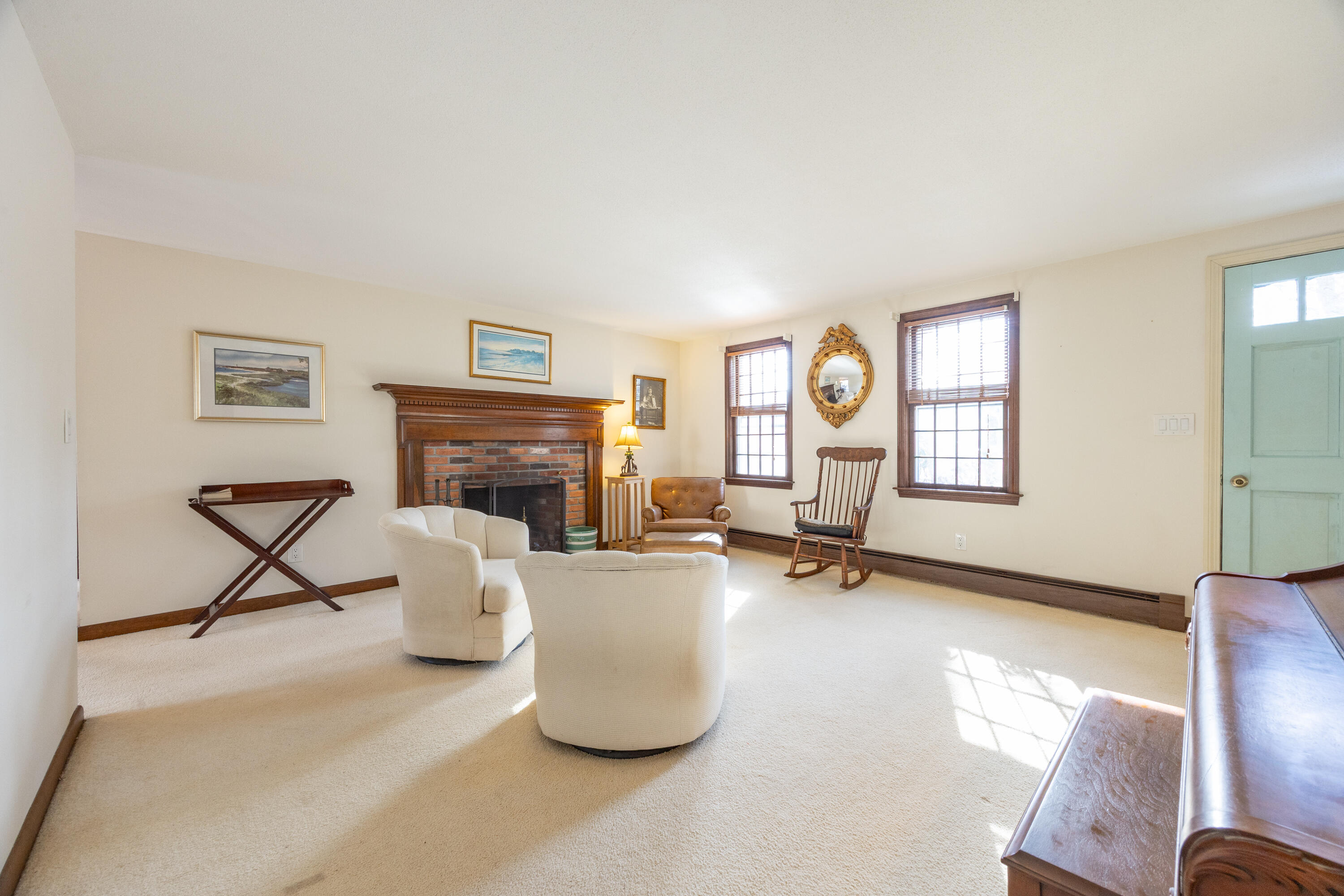 12 Canapitsit Drive East Falmouth, MA 02536 - Photo 14 of 34 a living room with furniture and a fireplace