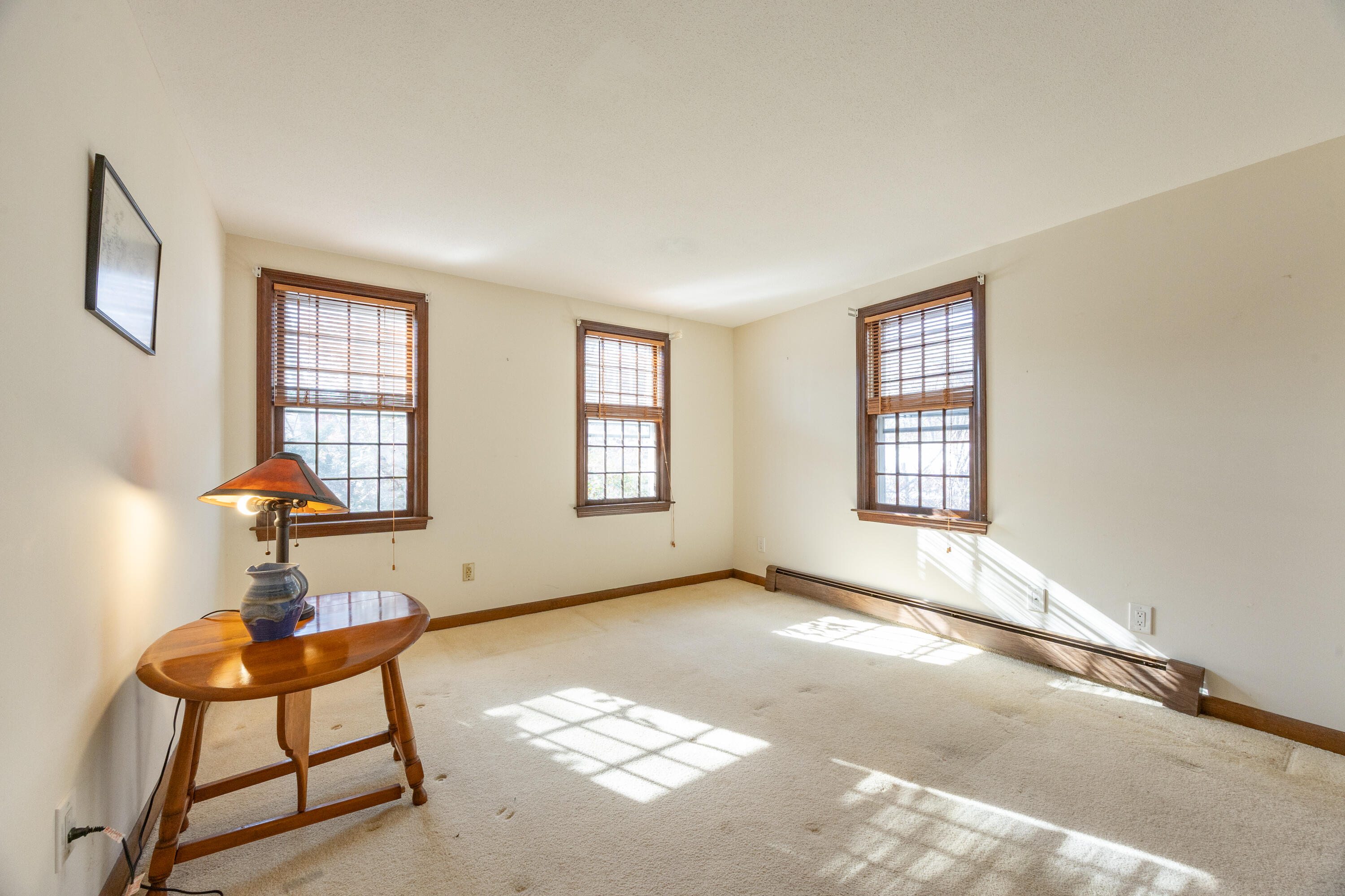 12 Canapitsit Drive East Falmouth, MA 02536 - Photo 15 of 34 a view of a room with windows and wooden floor