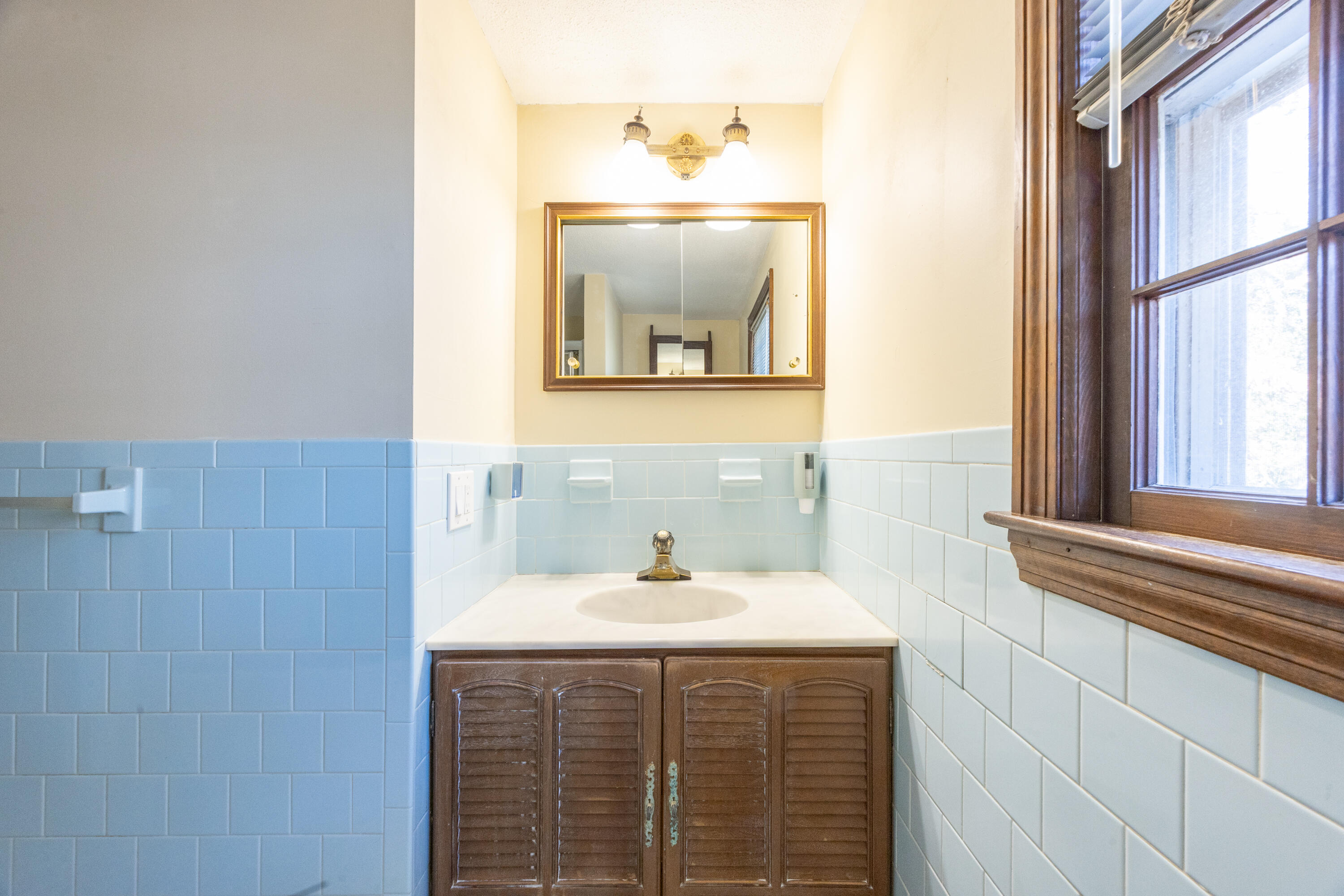 12 Canapitsit Drive East Falmouth, MA 02536 - Photo 18 of 34 a bathroom with a sink and a mirror