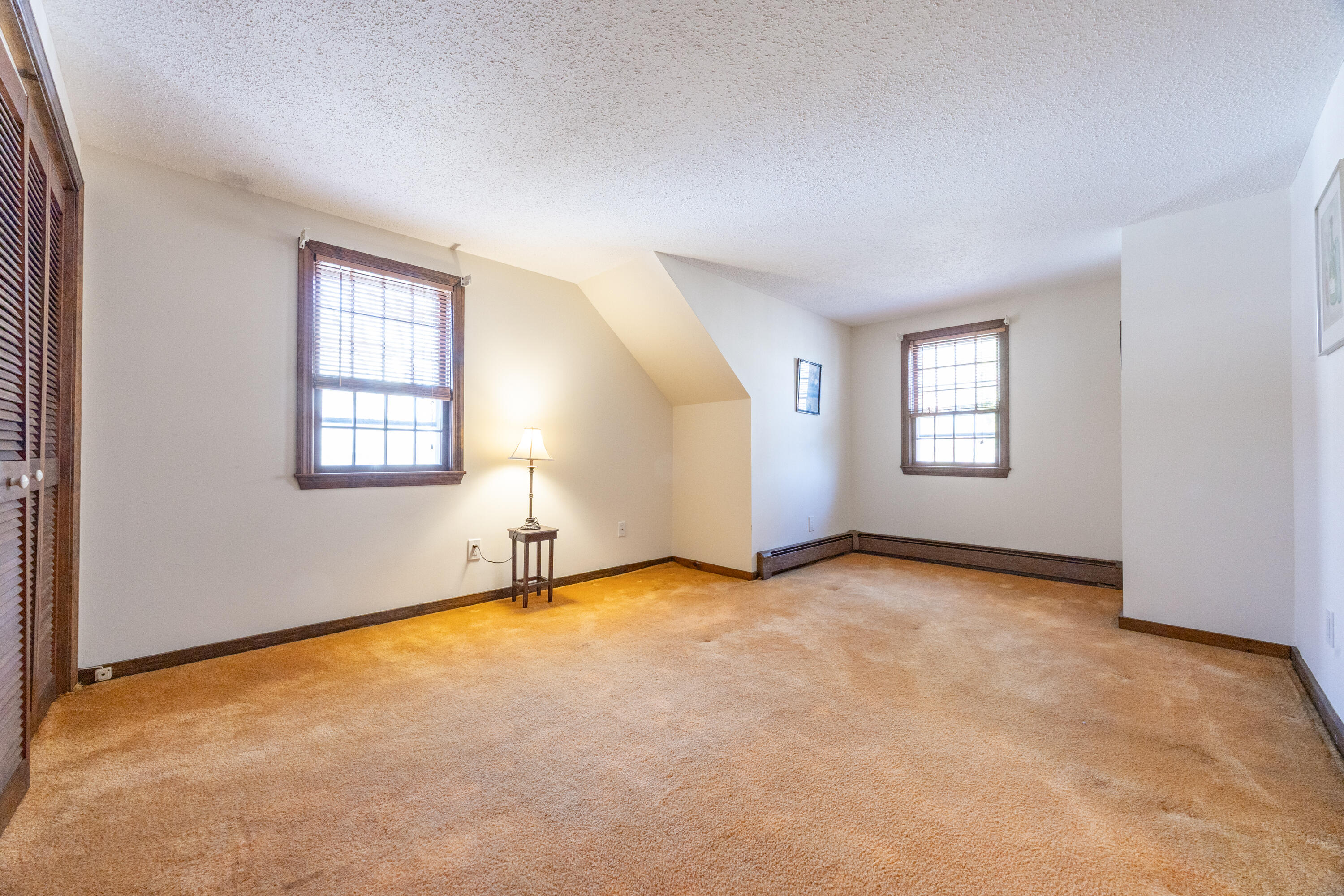 12 Canapitsit Drive East Falmouth, MA 02536 - Photo 19 of 34 an empty room with windows