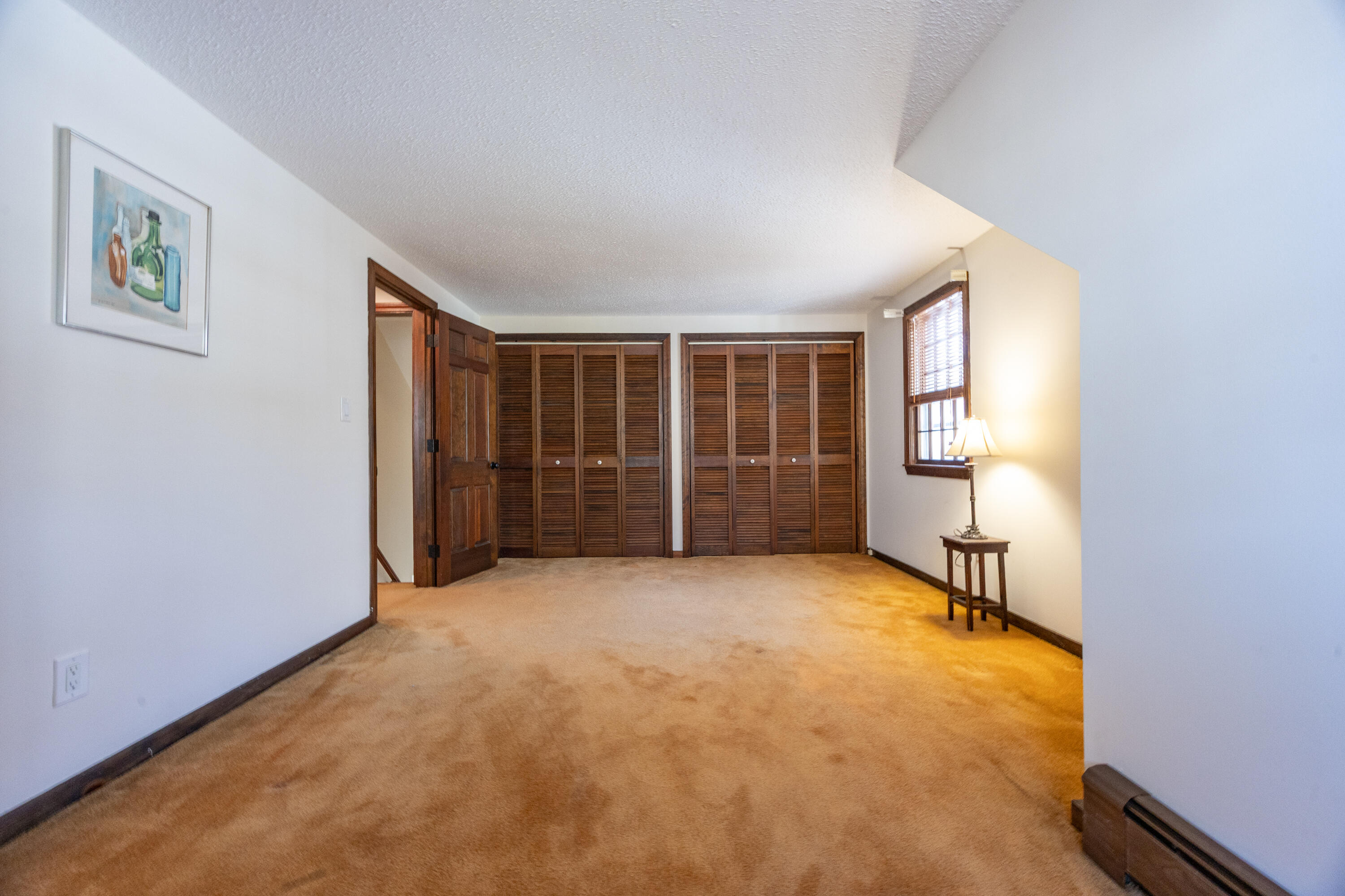 12 Canapitsit Drive East Falmouth, MA 02536 - Photo 20 of 34 an empty room with windows