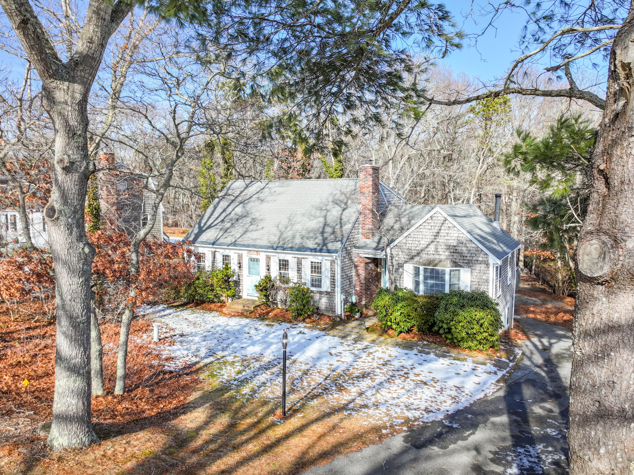12 Canapitsit Drive East Falmouth, MA 02536 - Photo 2 of 34 a view of a house with a yard