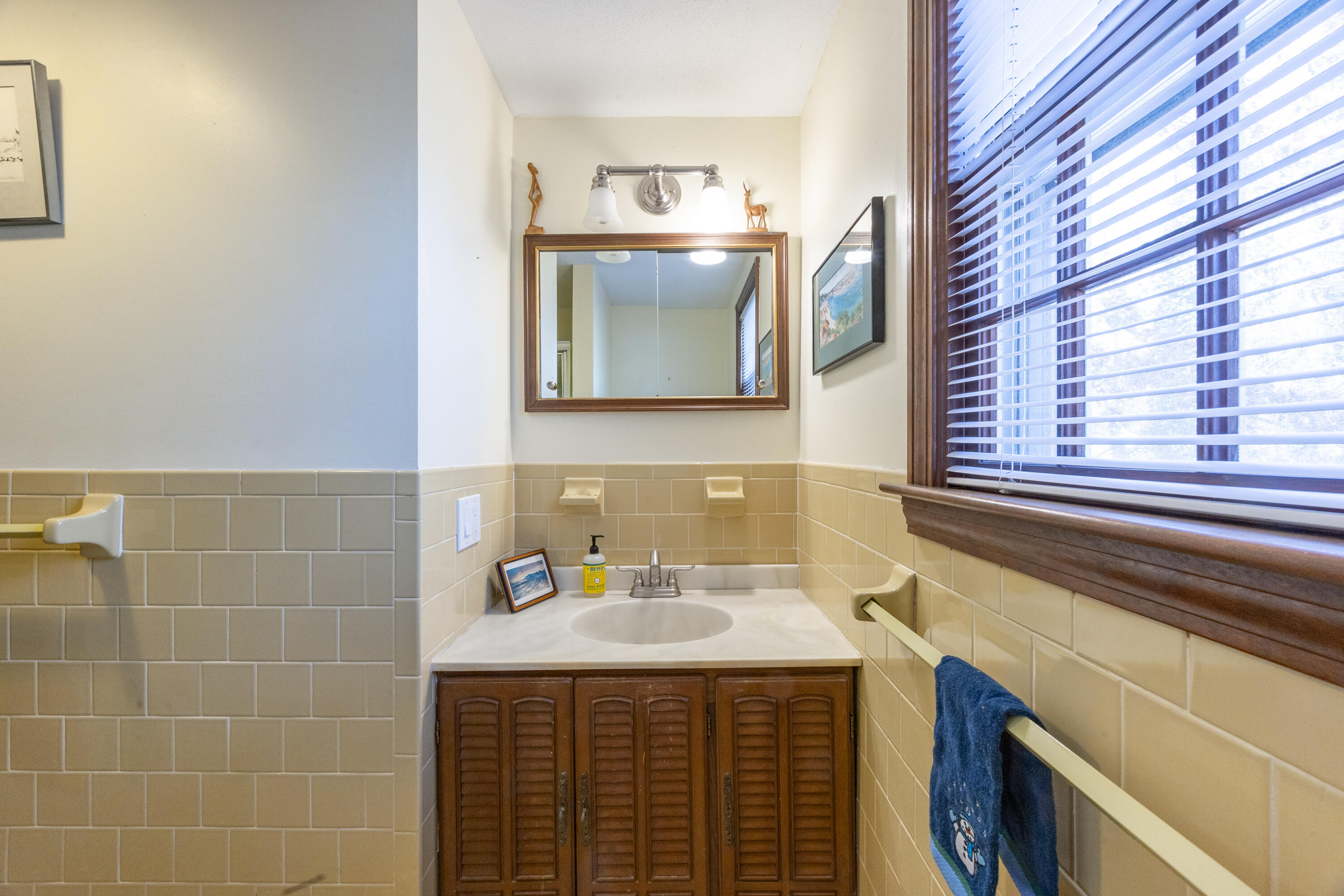 12 Canapitsit Drive East Falmouth, MA 02536 - Photo 24 of 34 a bathroom with a sink and a mirror