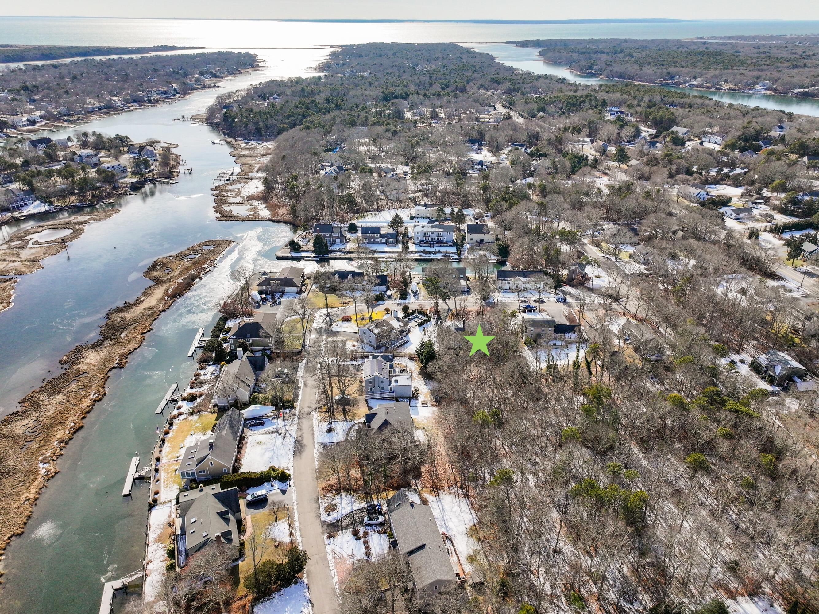 12 Canapitsit Drive East Falmouth, MA 02536 - Photo 31 of 34 an aerial view of a city