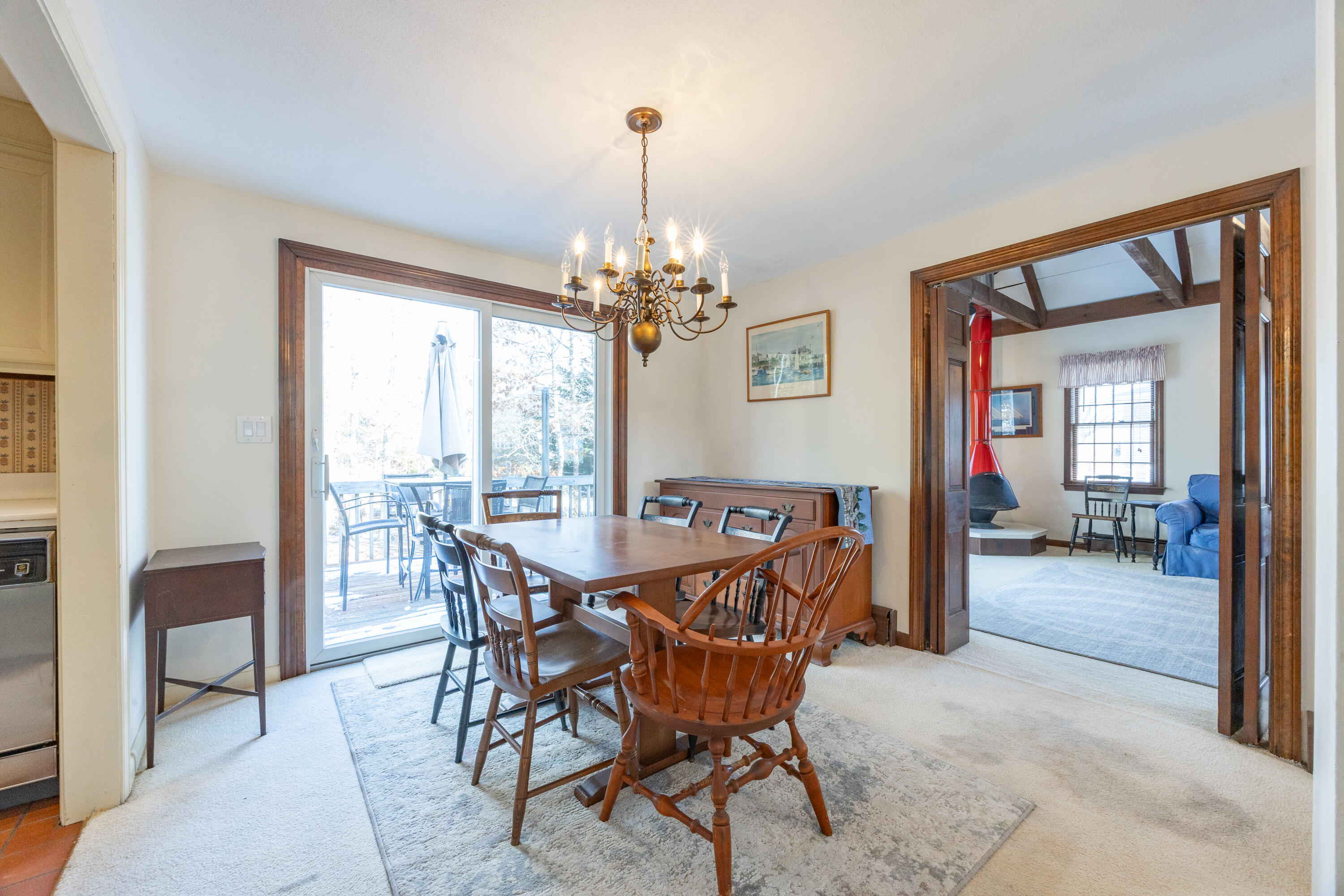 12 Canapitsit Drive East Falmouth, MA 02536 - Photo 7 of 34 a view of a dining room with furniture window and wooden floor