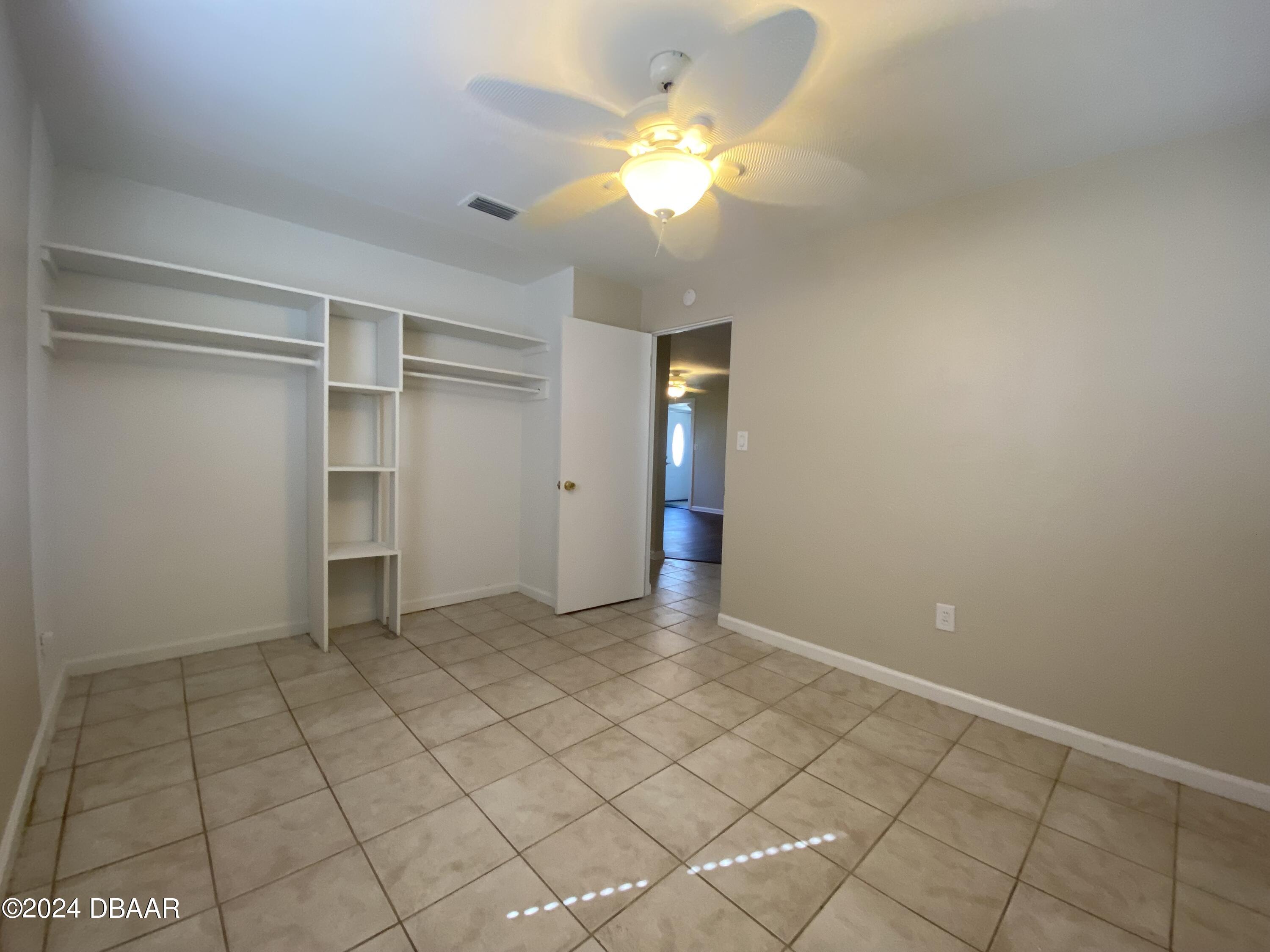 28 Rivershore Drive Ormond Beach, FL 32176 - Photo 8 of 16 a view of an empty room with a window