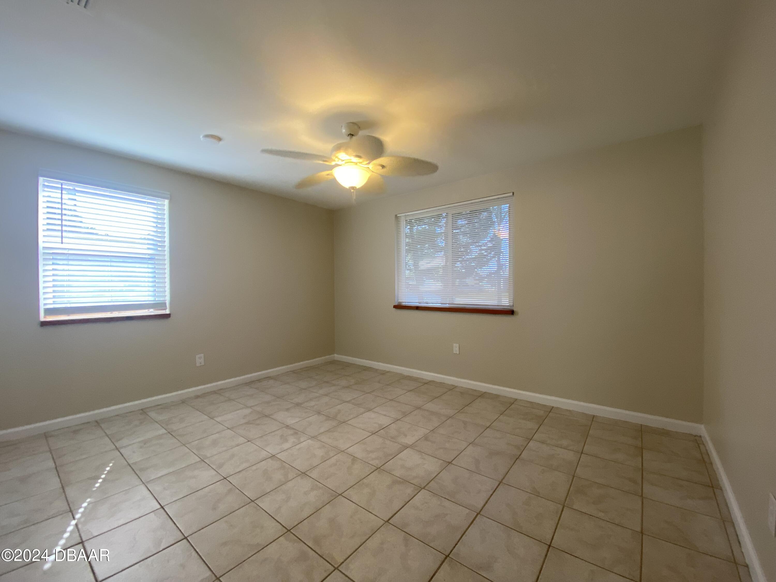 28 Rivershore Drive Ormond Beach, FL 32176 - Photo 10 of 16 a view of an empty room with a window