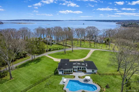 a view of a lake with a yard