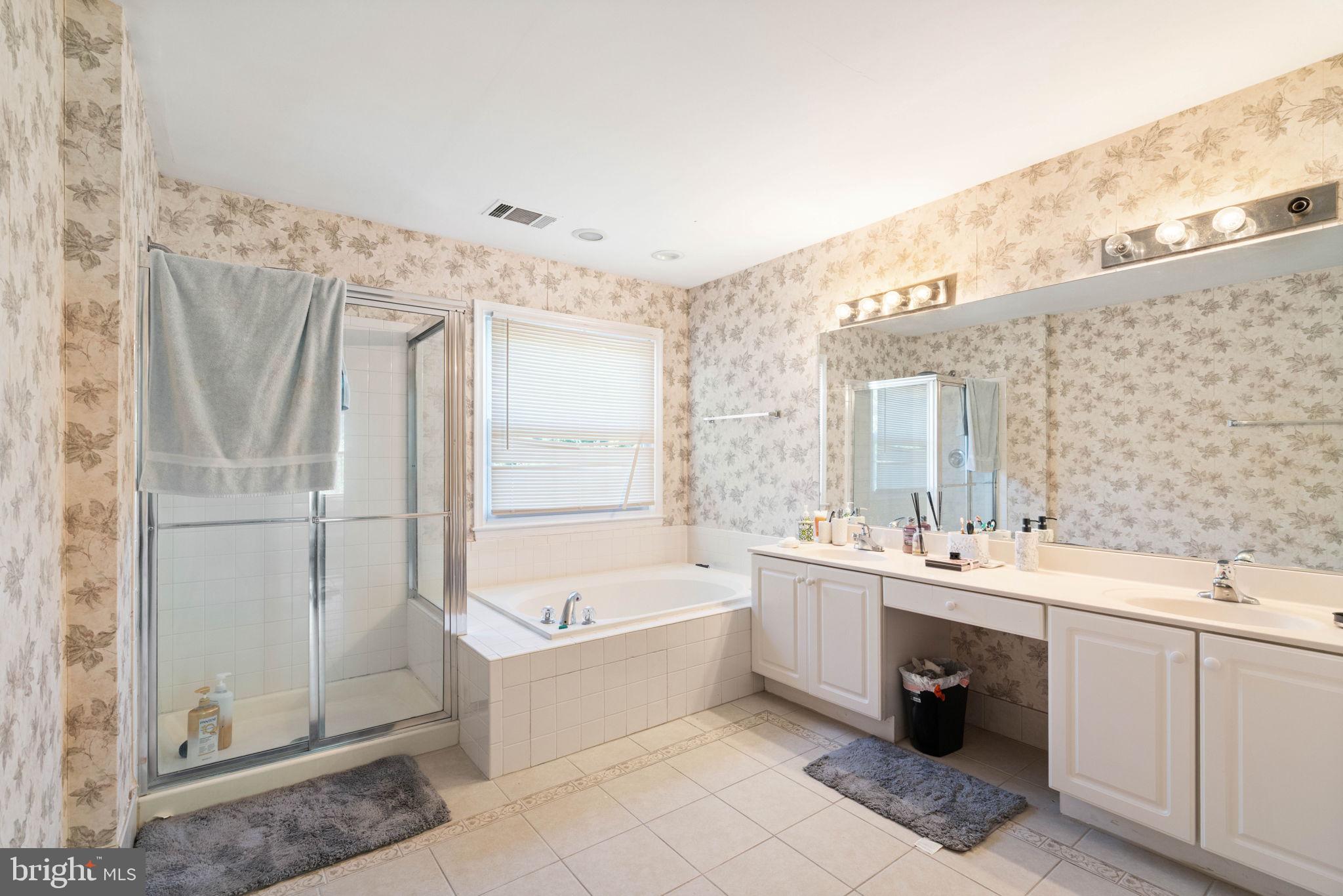 7616 Seabrook Lane Springfield, VA 22153 - Photo 20 of 35 Elegant bathroom with floral accents.