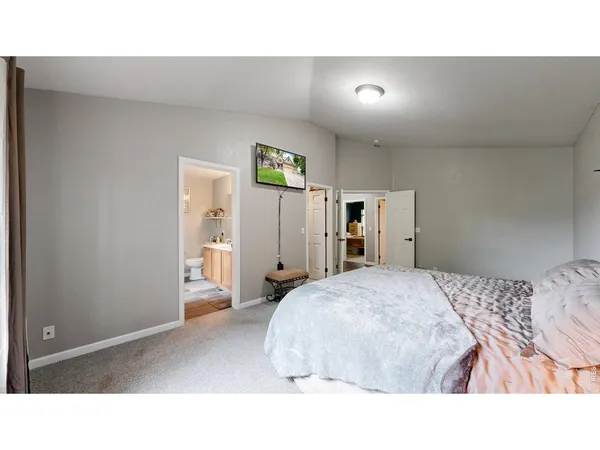 a living room with a bed