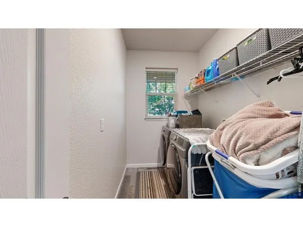 a kitchen with a sink and furniture