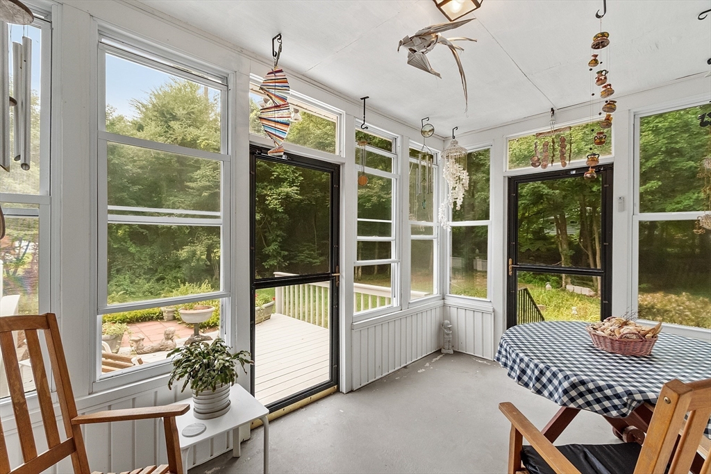 6 Ingalls Road Tyngsborough, MA 01879 - Photo 11 of 38 a bedroom with bed and glass door