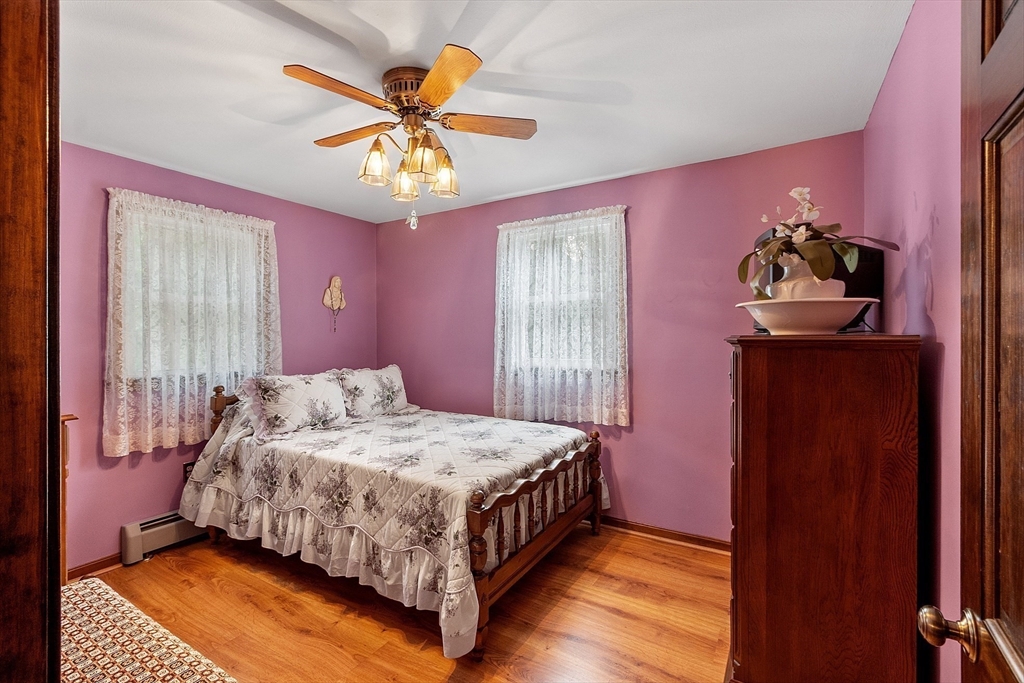 6 Ingalls Road Tyngsborough, MA 01879 - Photo 15 of 38 a bedroom with a bed and dresser