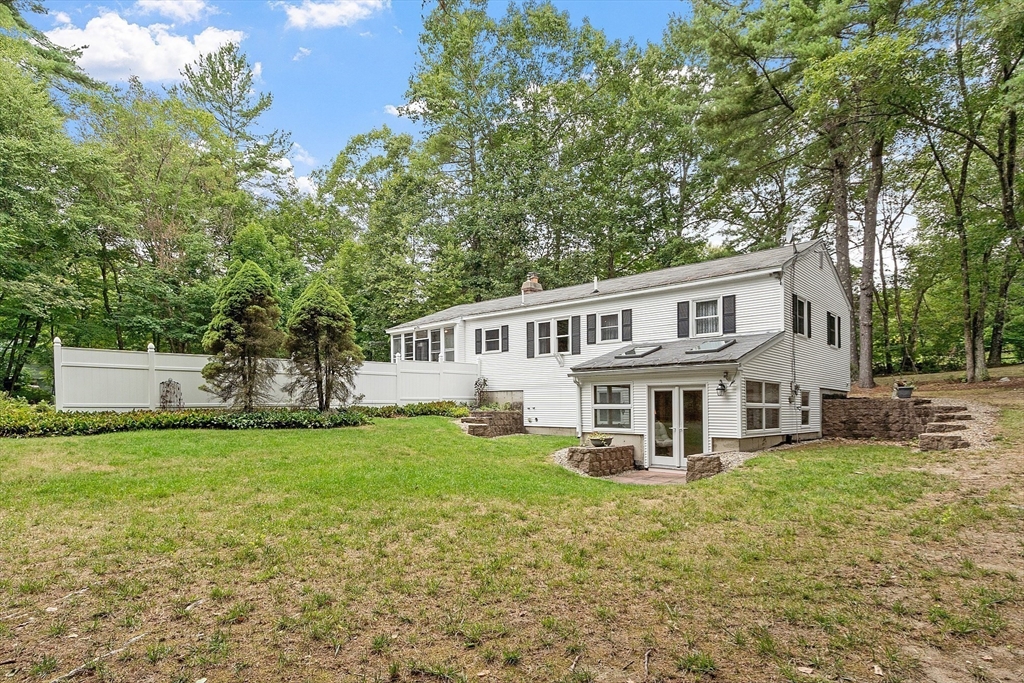 6 Ingalls Road Tyngsborough, MA 01879 - Photo 28 of 38 a view of a house with a yard