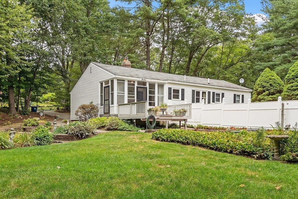 6 Ingalls Road Tyngsborough, MA 01879 - Photo 31 of 38 a view of a house with a yard and sitting area