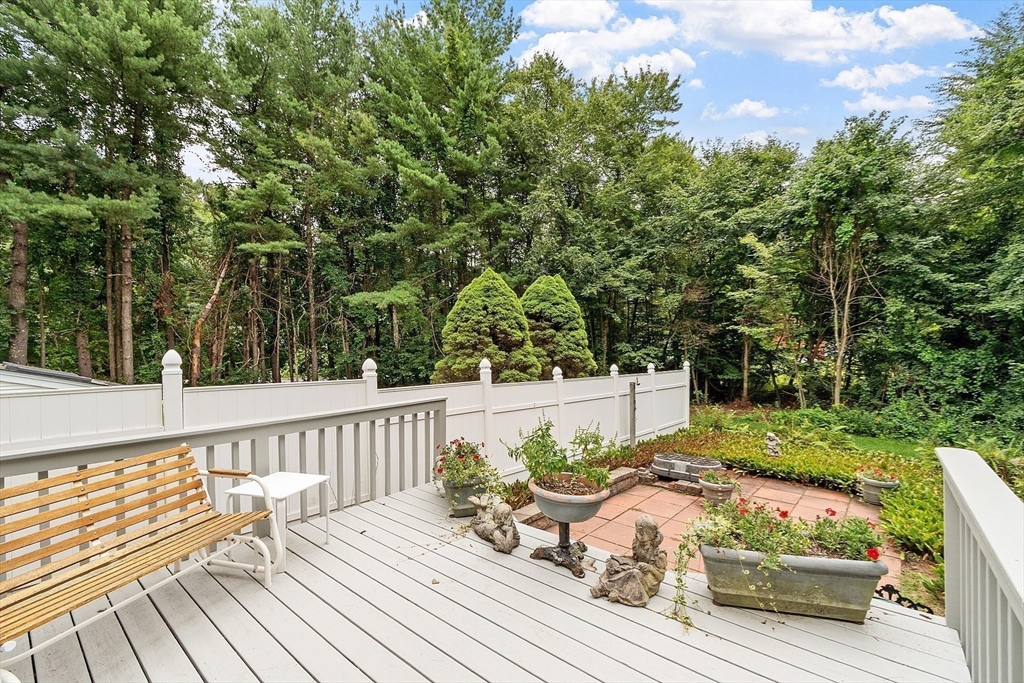 6 Ingalls Road Tyngsborough, MA 01879 - Photo 35 of 38 a view of house with patio outdoor seating and green space