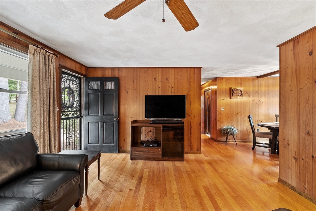 6 Ingalls Road Tyngsborough, MA 01879 - Photo 4 of 38 a living room with furniture and a flat screen tv