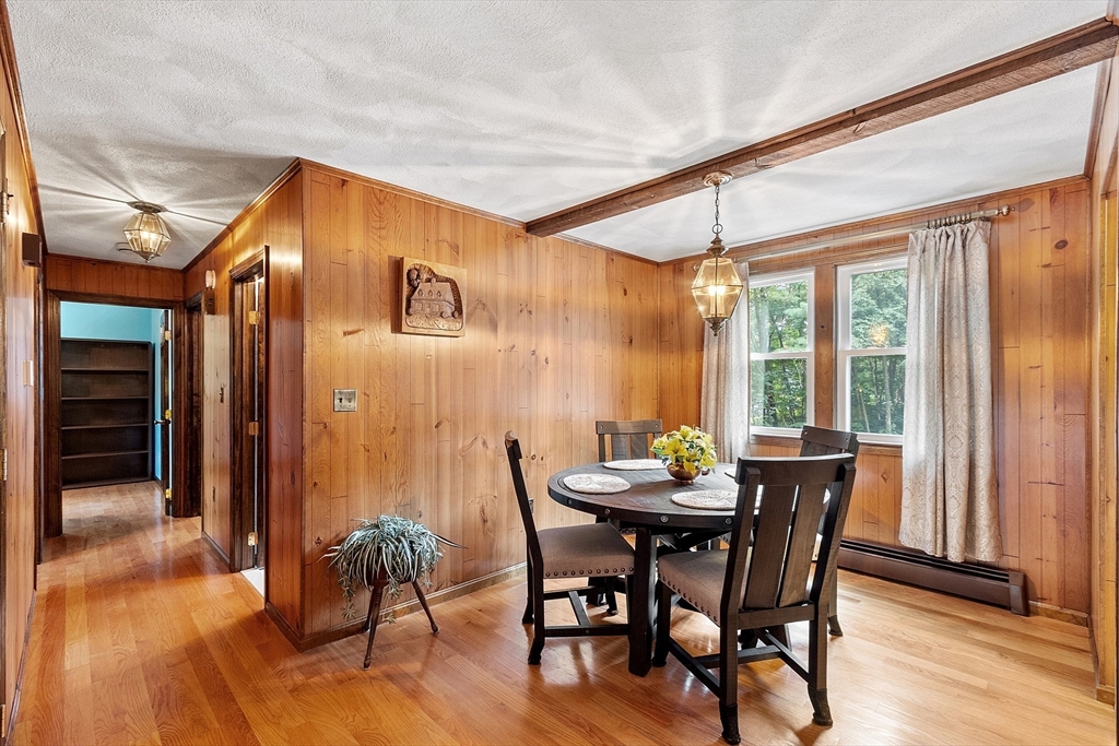 6 Ingalls Road Tyngsborough, MA 01879 - Photo 5 of 38 a view of a dining room with furniture window and wooden floor