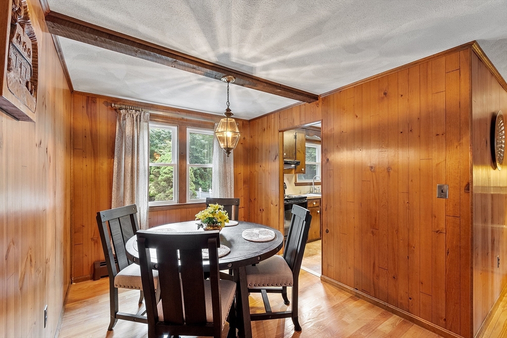 6 Ingalls Road Tyngsborough, MA 01879 - Photo 6 of 38 a view of a dining room with furniture window and wooden floor