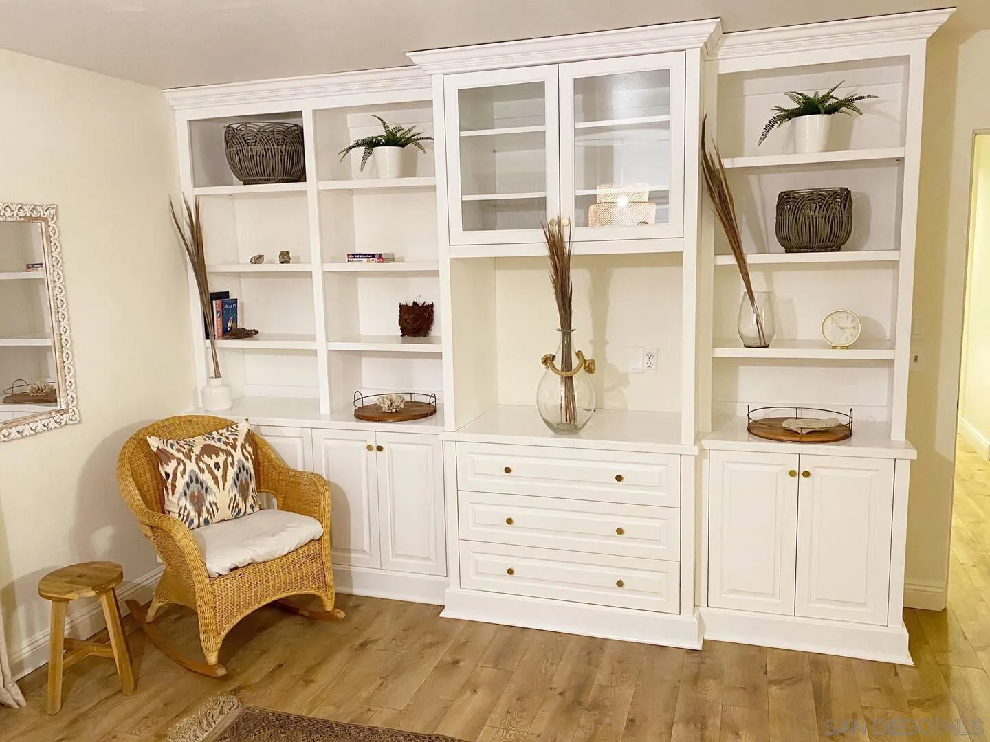 513 3rd Street Encinitas, CA 92024 - Photo 16 of 22 a bedroom with a bed and a wooden floor