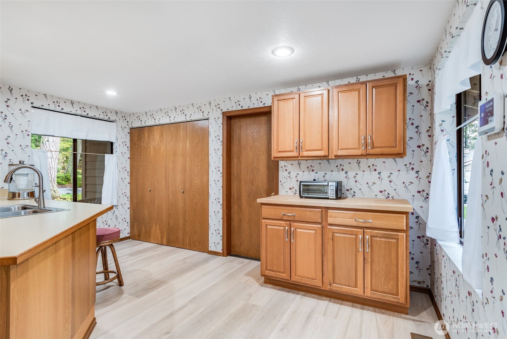 1322 Boise Street Fircrest, WA 98466 - Photo 12 of 40 a kitchen with stainless steel appliances granite countertop a sink stove and refrigerator