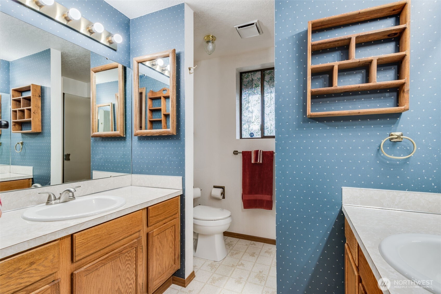 1322 Boise Street Fircrest, WA 98466 - Photo 23 of 40 a bathroom with a sink a toilet and shower
