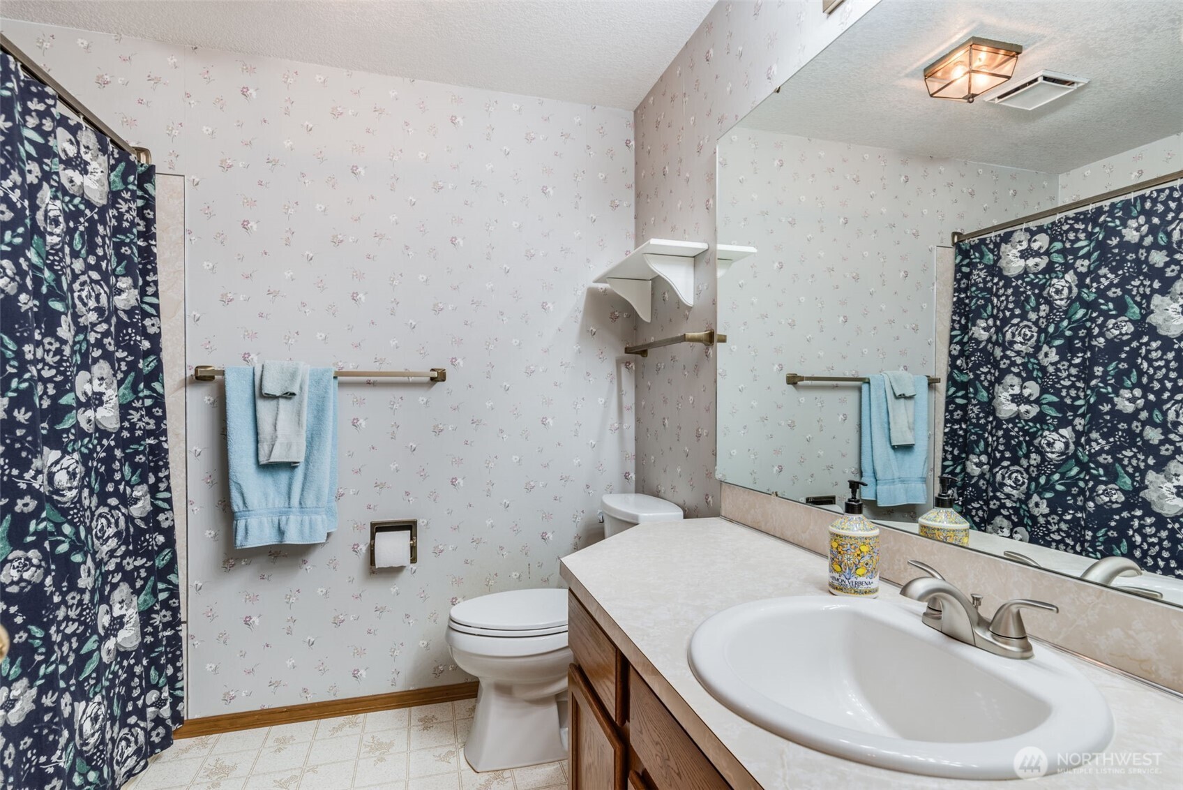 1322 Boise Street Fircrest, WA 98466 - Photo 29 of 40 a bathroom with a sink toilet and shower