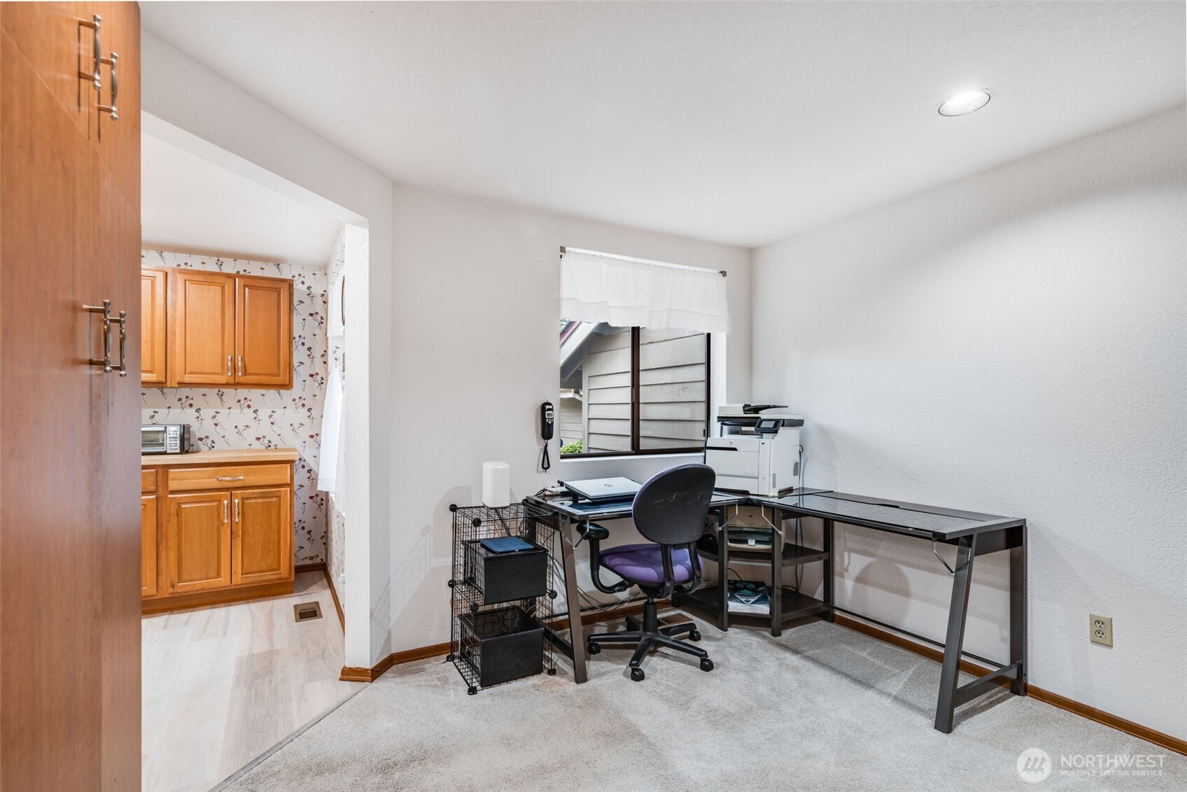 1322 Boise Street Fircrest, WA 98466 - Photo 30 of 40 a view of a workspace with furniture and a window