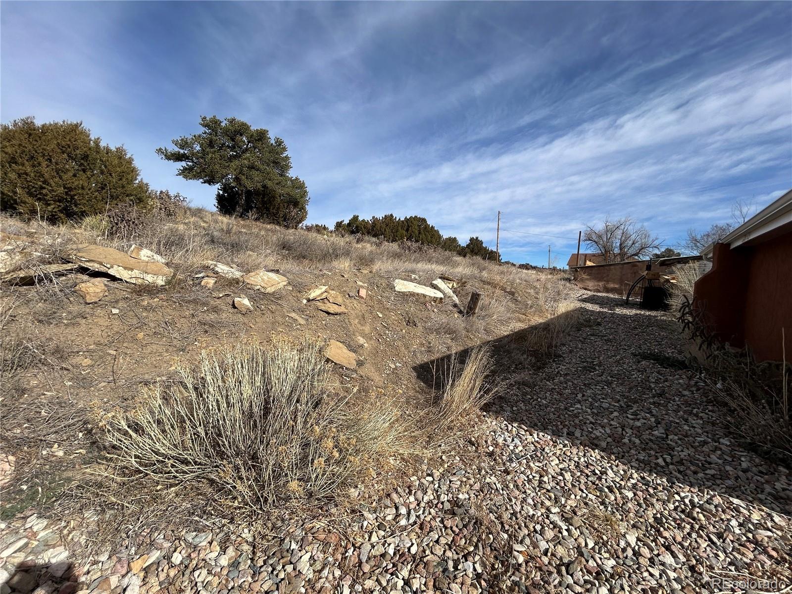 26 West 3rd Street Walsenburg, CO 81089 - Photo 25 of 27 a view of a backyard of the house