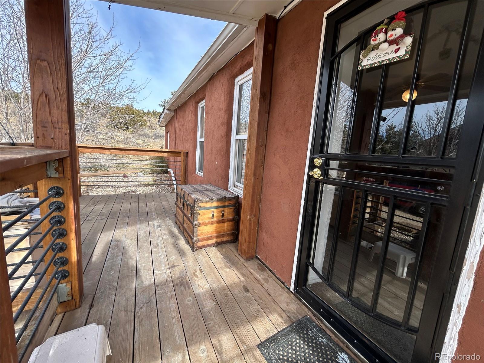26 West 3rd Street Walsenburg, CO 81089 - Photo 4 of 27 a view of an entryway with wooden floor