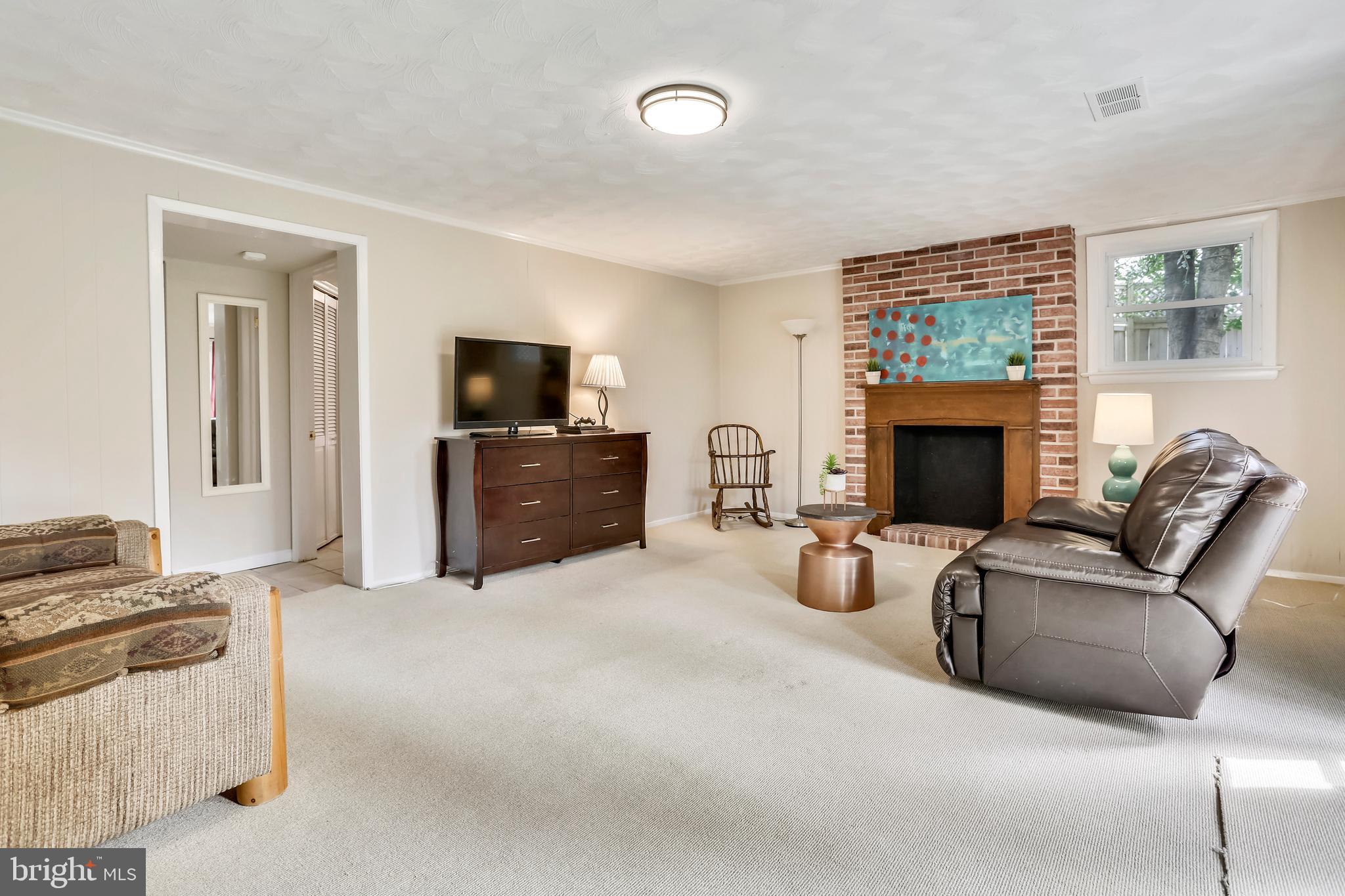 5339 Pooks Hill Road Bethesda, MD 20814 - Photo 19 of 27 family room on lower level