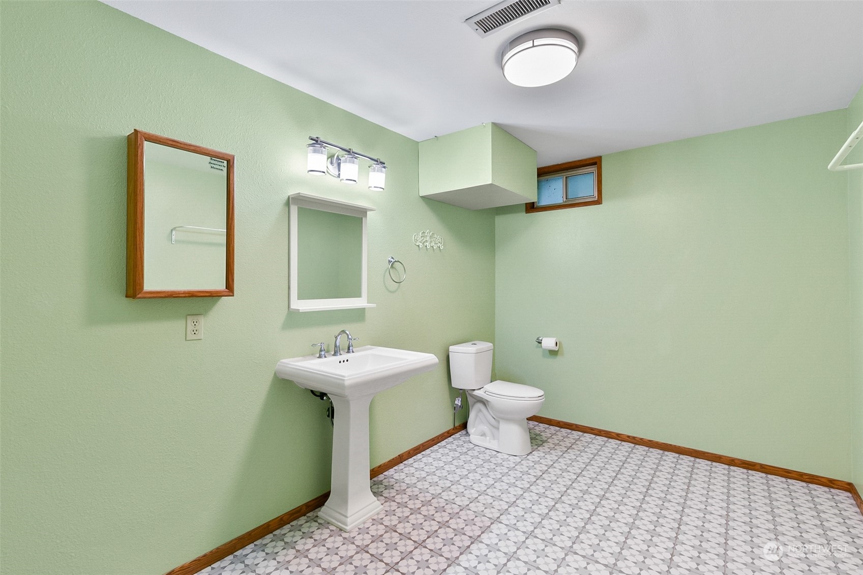 4848 Sharpe Road Anacortes, WA 98221 - Photo 23 of 33 a bathroom with a sink and a toilet