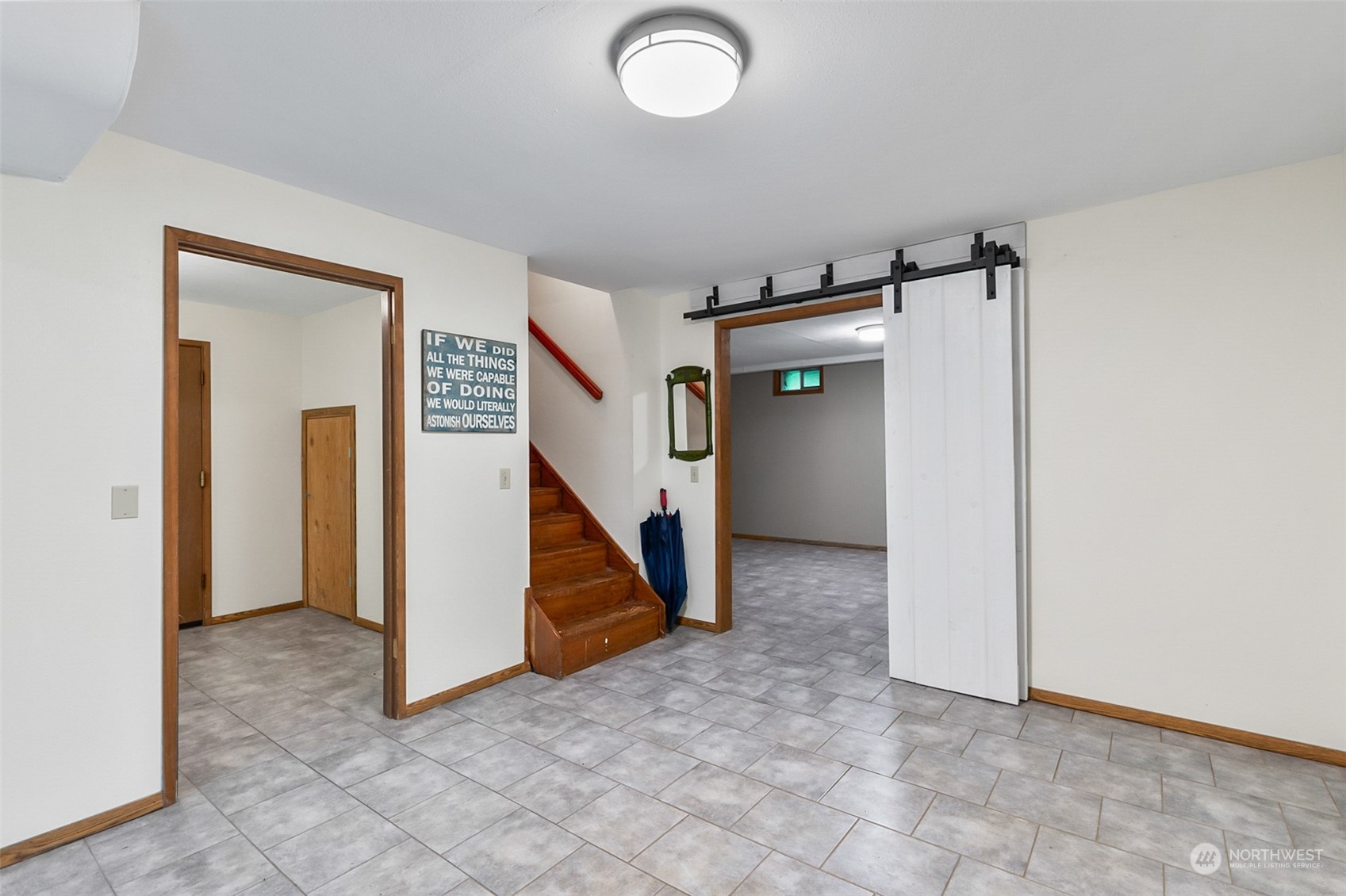 4848 Sharpe Road Anacortes, WA 98221 - Photo 24 of 33 an empty room with a ceiling fan and entryway