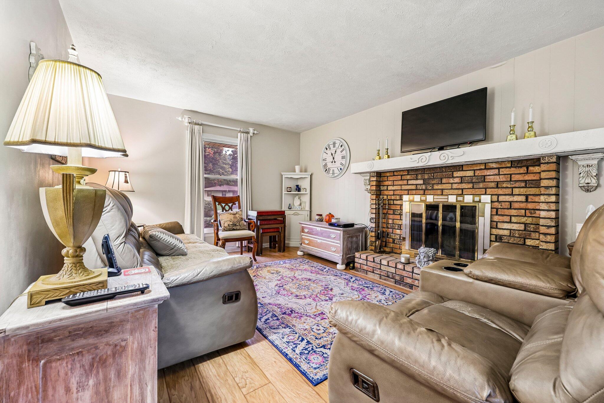 21875 Clearfield Road Brookfield, WI 53045 - Photo 10 of 29 Use the natural fireplace to warm up on those chilly nights.
