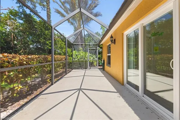 a view of a pathway with a balcony