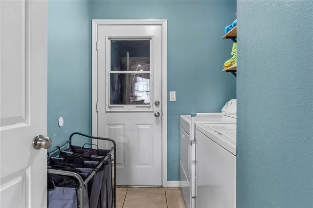 a bathroom with a granite countertop sink and a stove
