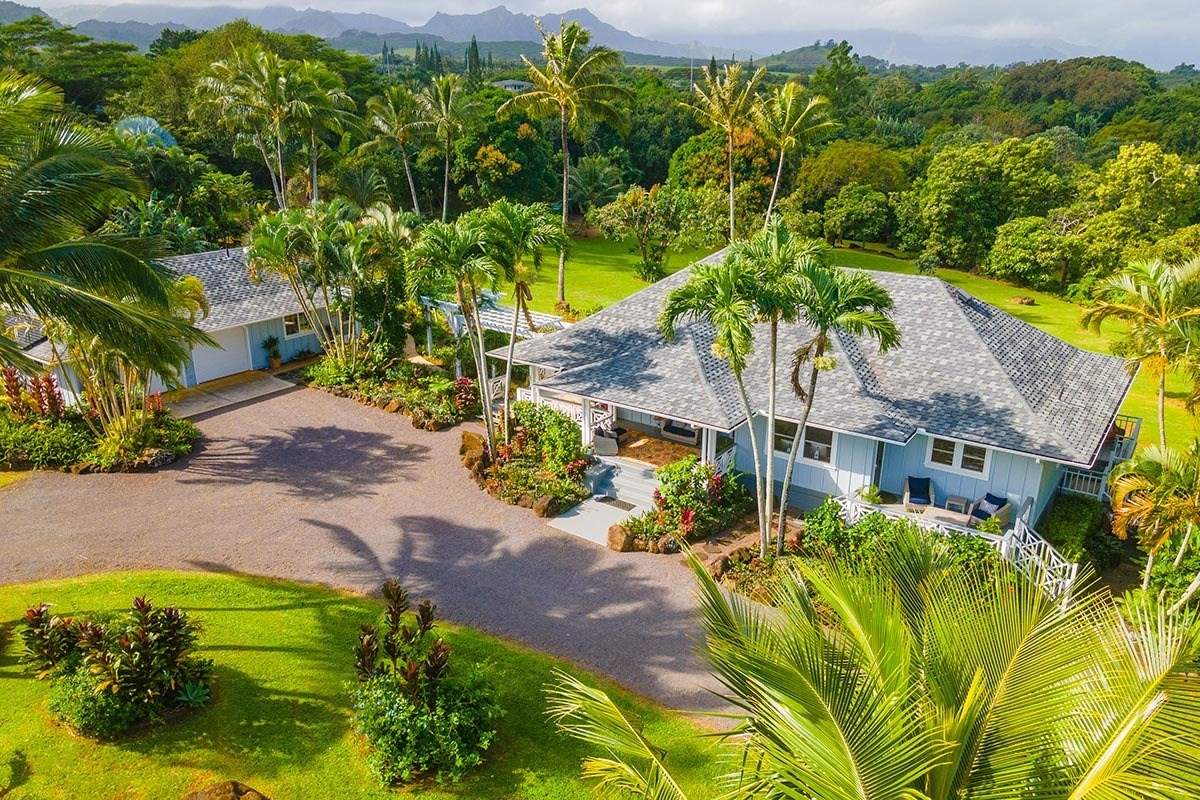 7475 E Koolau Road, Unit D Kilauea, HI 96754 - Photo 3 of 30 a view of swimming pool with a garden