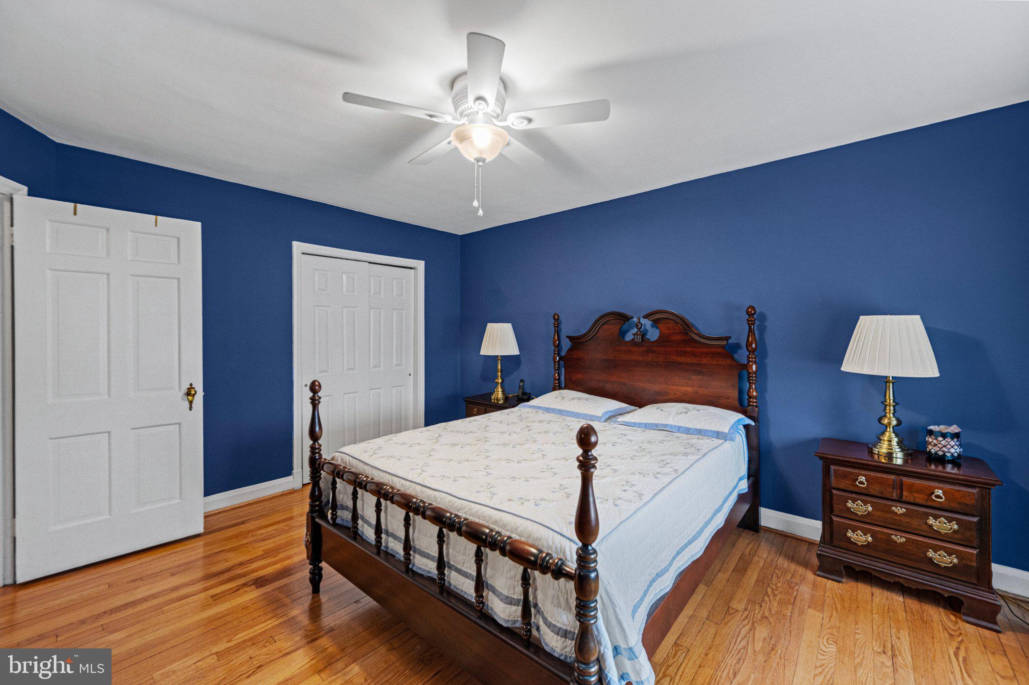 406 Greenlow Road Baltimore, MD 21228 - Photo 18 of 31 Charming bedroom with bold blue walls.