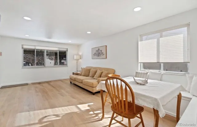 a bedroom with a bed and a table