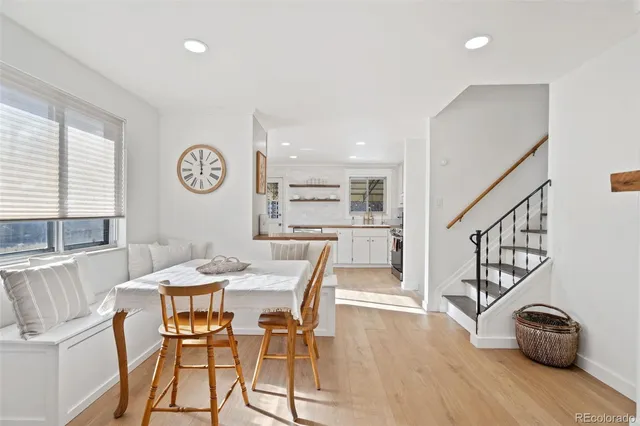 a bedroom with a bed and a table