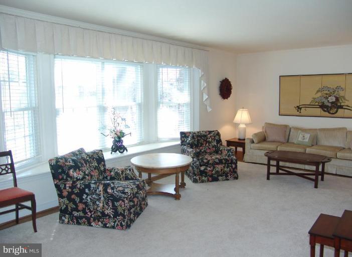 245 Providence Road Annapolis, MD 21409 - Photo 2 of 27 a living room with furniture and a large window