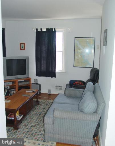 245 Providence Road Annapolis, MD 21409 - Photo 15 of 27 a bedroom with furniture and a flat screen tv