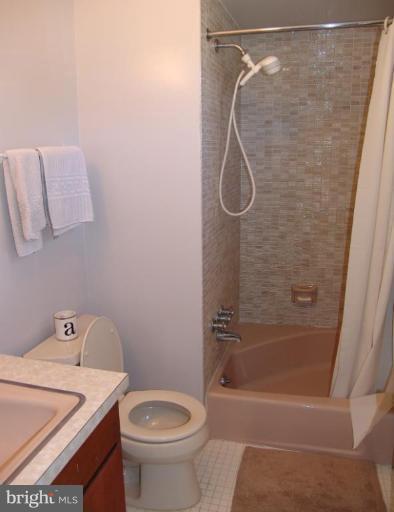 245 Providence Road Annapolis, MD 21409 - Photo 16 of 27 a bathroom with a sink a toilet and shower