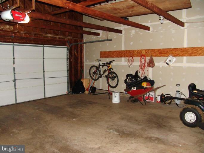 245 Providence Road Annapolis, MD 21409 - Photo 17 of 27 a view of a garage with rack and bicycle