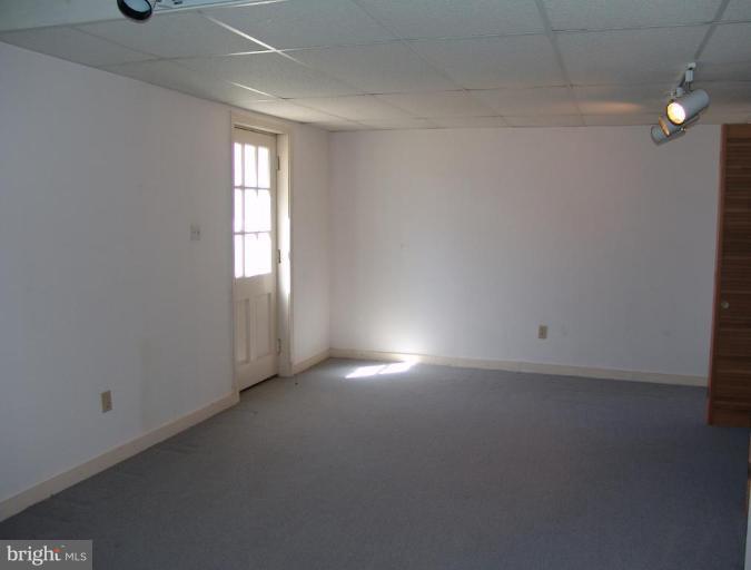 245 Providence Road Annapolis, MD 21409 - Photo 20 of 27 an empty room with windows and closet