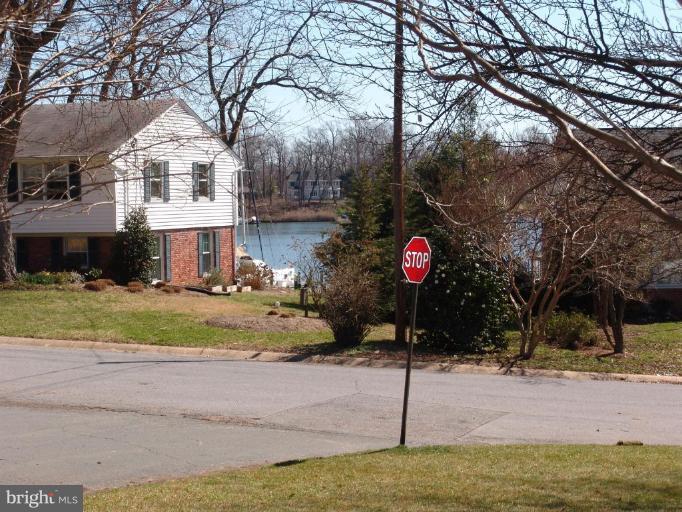 245 Providence Road Annapolis, MD 21409 - Photo 27 of 27 a front view of a house with a yard and tree s