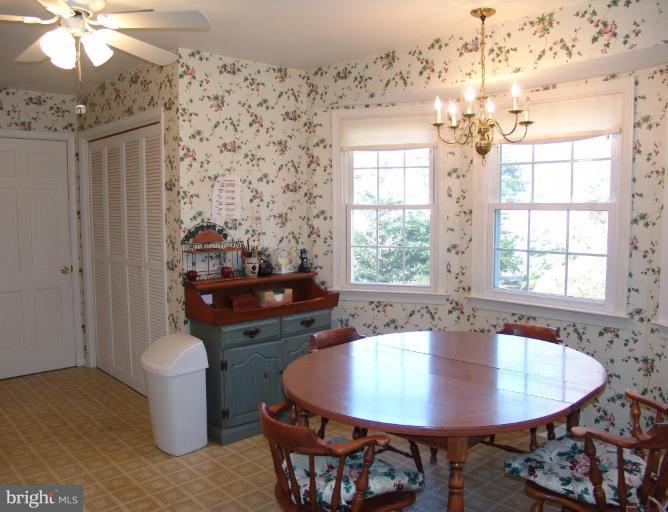 245 Providence Road Annapolis, MD 21409 - Photo 9 of 27 a dining room with furniture and window